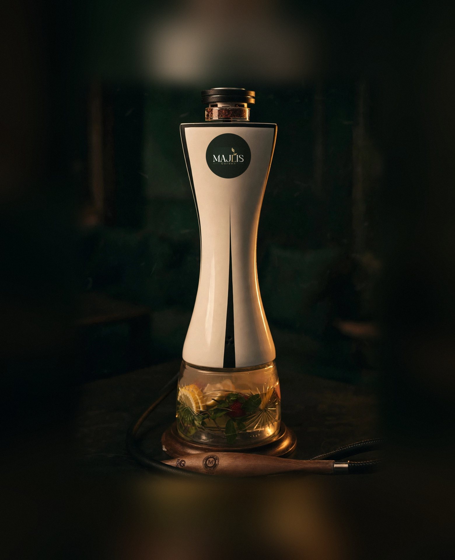 The Boss ceramic hookah with the Majlis Garden crest, served at Majlis Garden